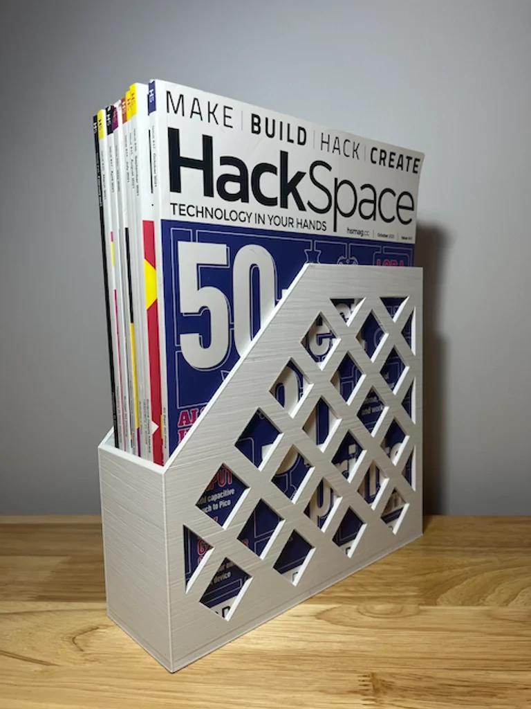 White printed magazine file box with diamond openings holding magazines